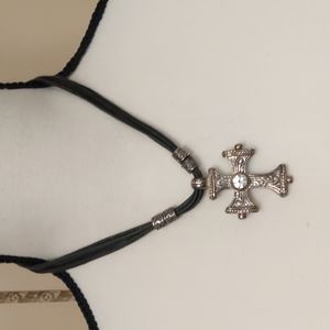 Cross Necklace in black and silver tone.
